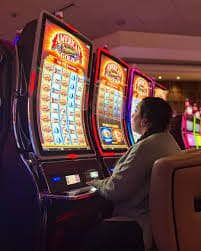 Adventures Beyond Wonderland slot game grid showing themed symbols and payline structure
